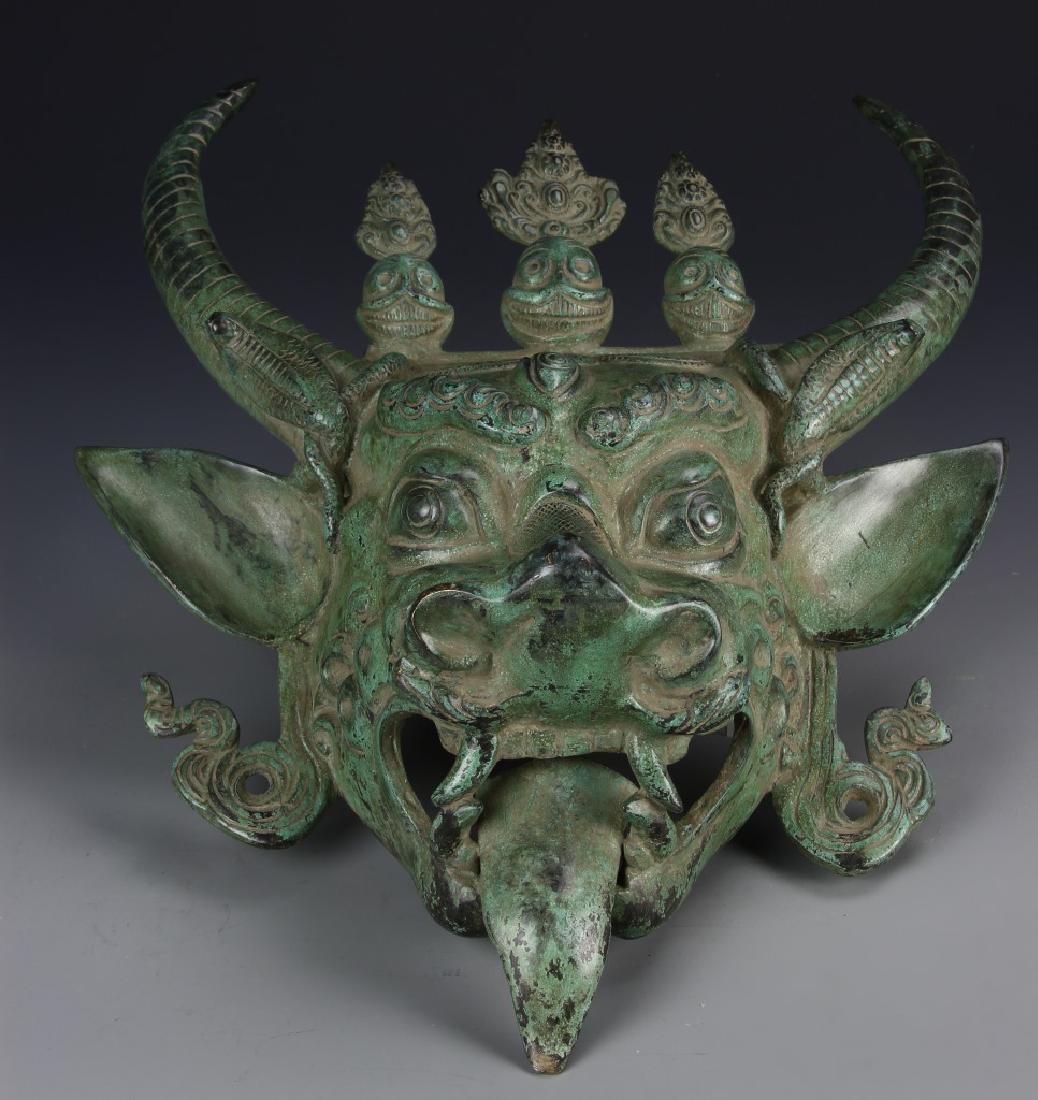 Tibetan Bronze Mask of a Demon (1 of 3)