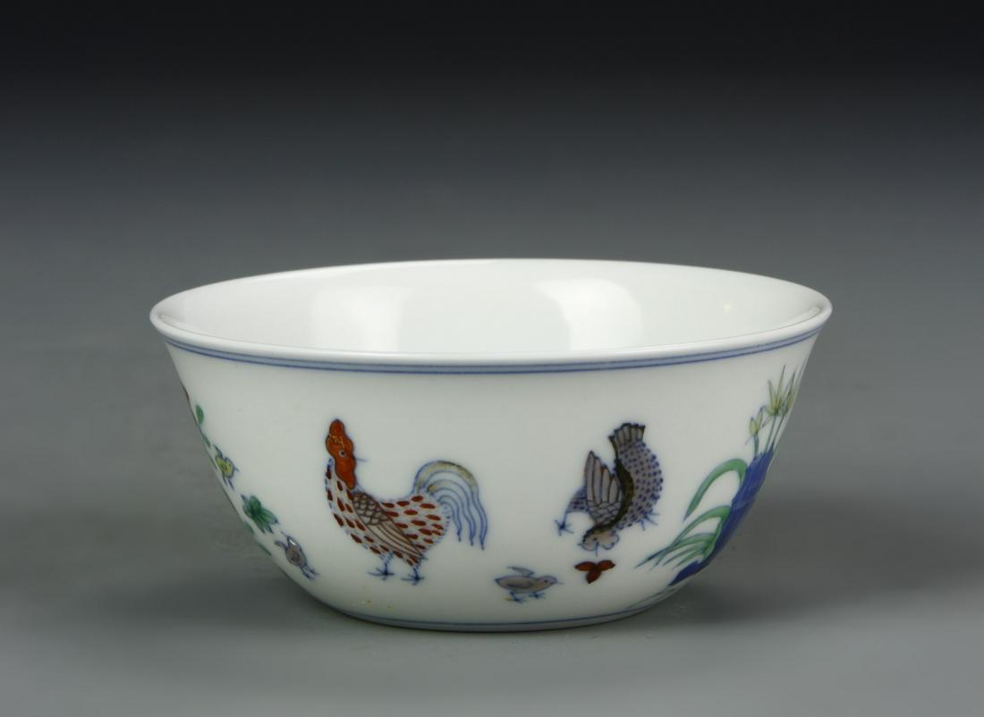Chinese Doucai Chicken Cup: China, 19th C., Doucai chicken cup Ming Chenghua mark. Provenance: Acquired from Hot Fei Mr& Muller Portland Collection 1968. Width 3 in., Height 1 3/8 in.