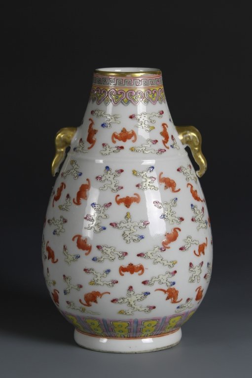 Chinese Famille Rose Vase: Famille rose gu vase, China, 19th century, decorated with the motif of one-hundred bats, with a border of leiwen along the gilt rim and ruyi motifs beneath, with six-character Daoguang mark on base. H