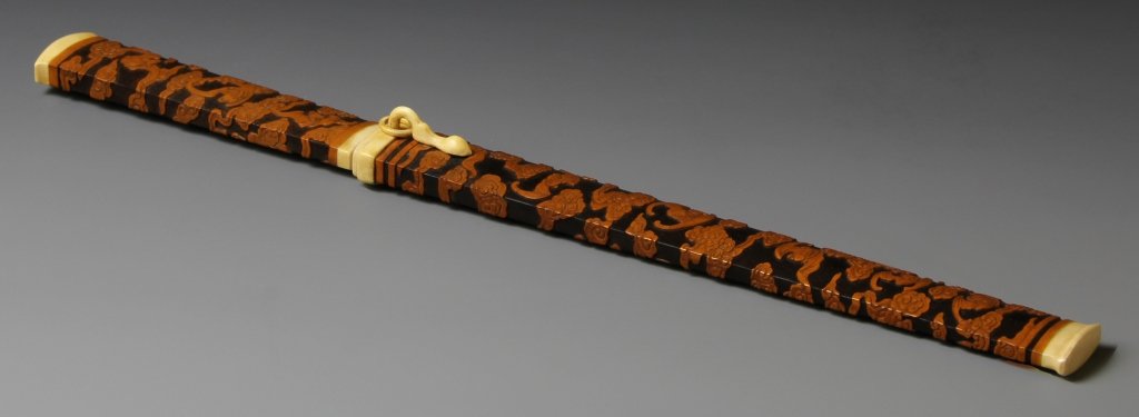 Chinese Ivory Knife with Bamboo Scabbard: China, 19th C, carved ivory knife with carved bamboo scabbard, decorated with intricately carved bats and lucky clouds. Length 13 1/4 in.; Width 1 1/4 in.