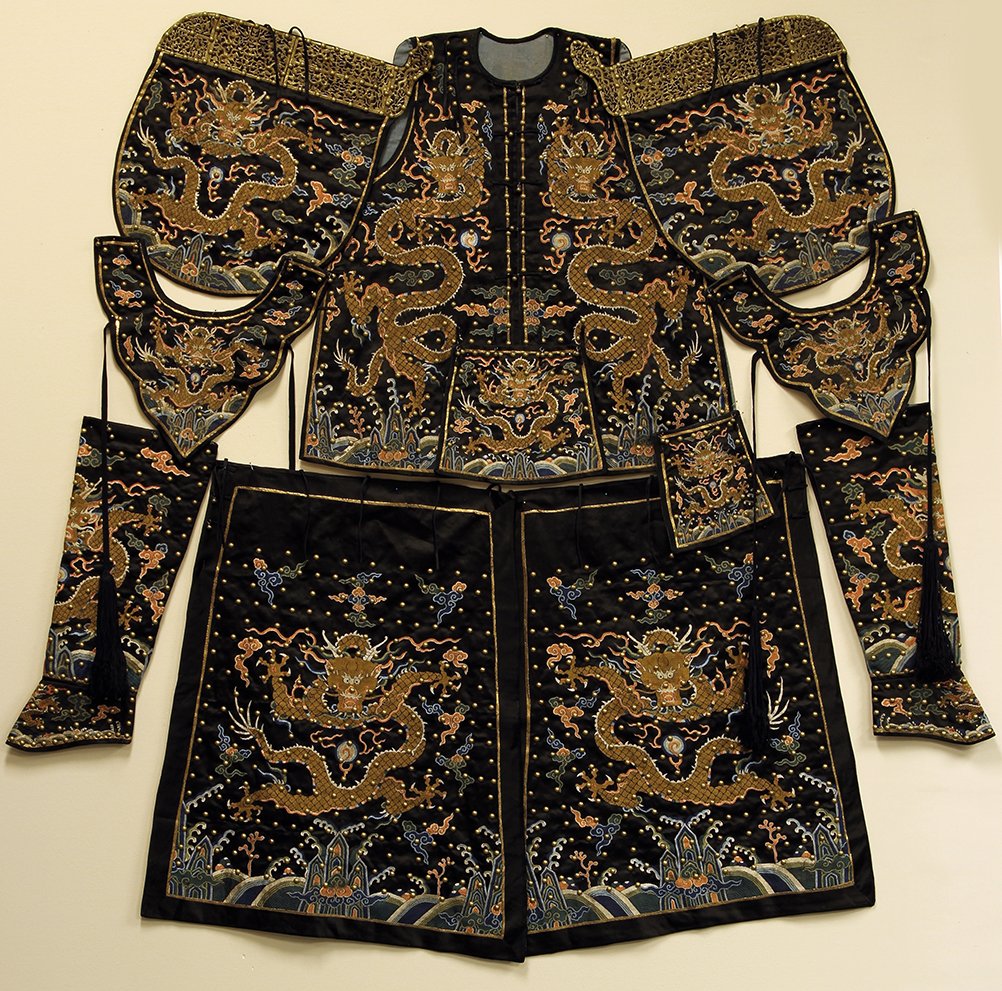 Chinese Silk Embroidery Ceremonial Armor Robe: China, silk embroidery ceremonial armor robe with brass metal work, embroidered with dragons amid clouds over all and dotted with brass works, Height 59 1/2 in.; Width 57 1/2 in.