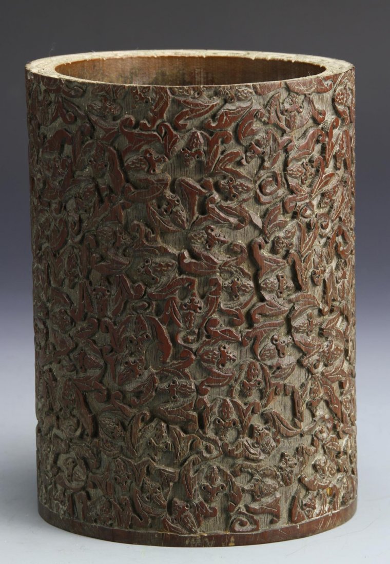 Chinese Bamboo Brush Pot: China, 19th C., carved bamboo brush pot, fully carved in an elaborate pattern of bats. Height 7 in., Width 5 1/2 in.