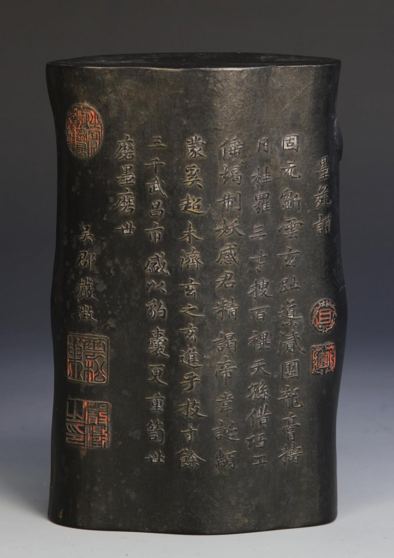 Chinese Inkstone: China, inkstone depicting two figures engaged in conversation, the scene takes place in a landscape and is painted with colors of golds, greens, and reds, reverse contains carved characters and seals,