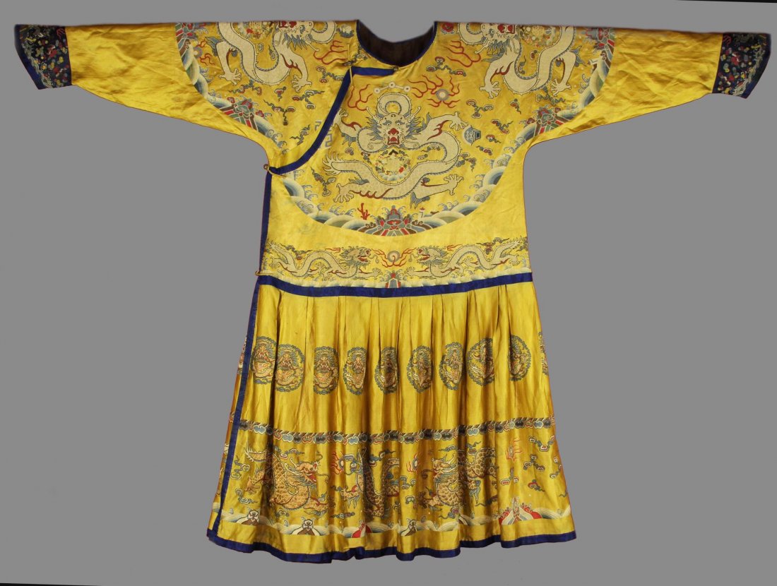 Chinese Imperial Dragon Robe: China, 18th/19th C., imperial silk embroidery dragon robe, chaofu, embroidered with dragons on yellow silk. Length 52 3/4 in., Width 77 in.