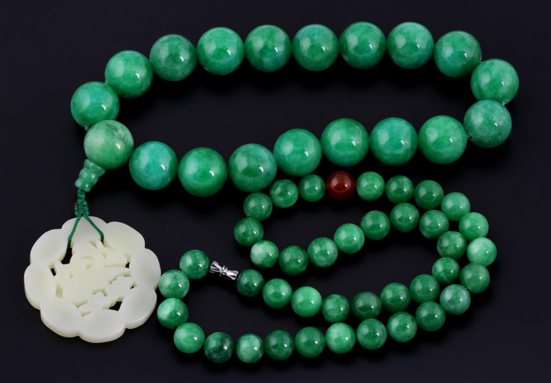 Two Jade Beaded Bracelets: China, jade beaded bracelets. Diameter 9 1/2 in.
