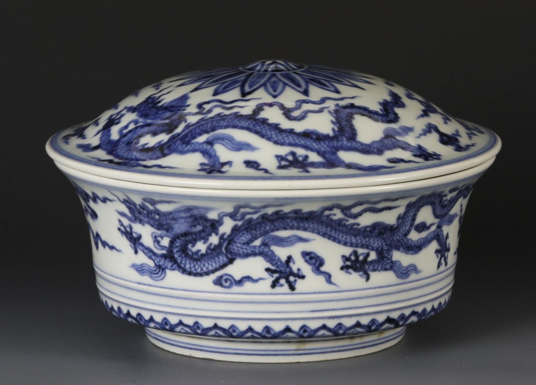 Chinese Blue and White Covered Bowl: China, blue and white covered bowl, the decorative motif features flowing dragon figures and clouds, Xuantong mark on base. Height 4 1/2 in., Width 7 in.