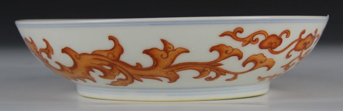 Chinese Blue, White, and Red Glazed Dish: China, 19th C., blue, white, and red glazed dish with chi dragons, Yongzhen mark on base. Diameter 6 in., Height 1 1/2 in.