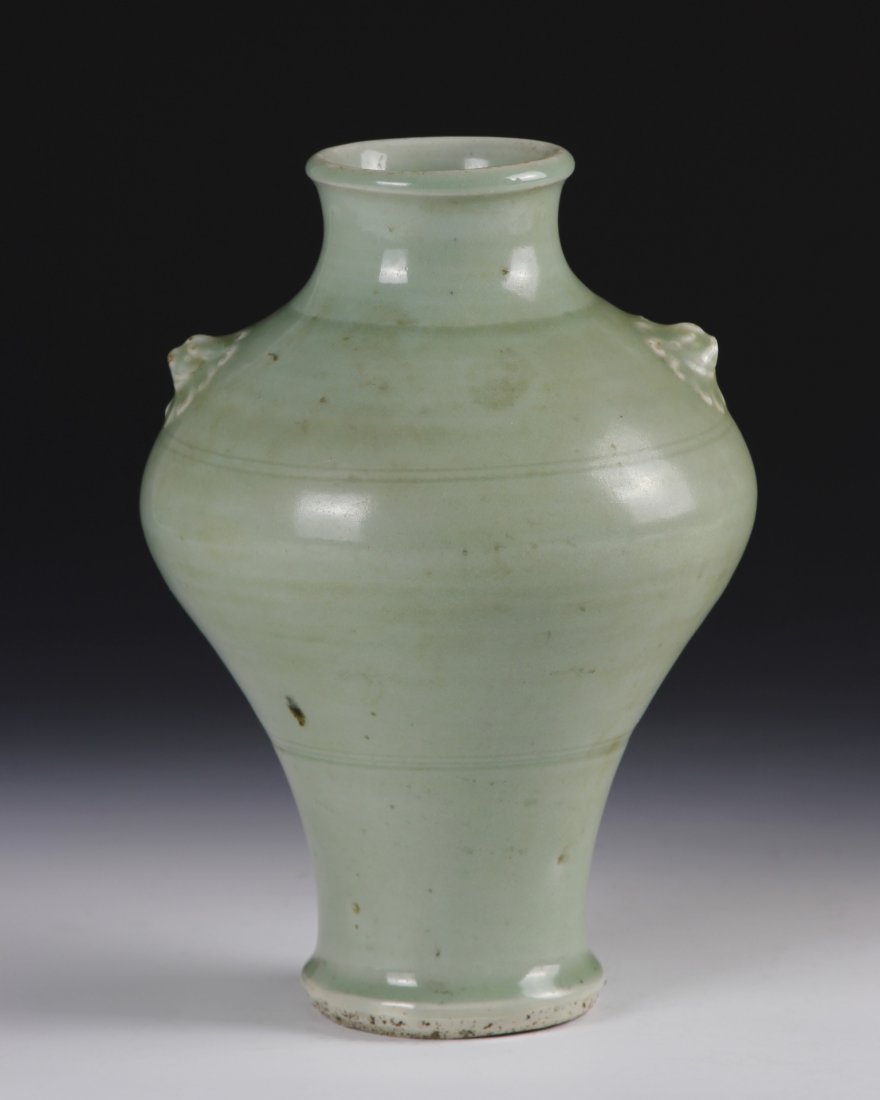Chinese Lung Kuan Vase: China, Yuan Dynasty, Lung Kuan ware vase, minor chip on rim. Height 9 in., Width 6 in. Provenance: A private collection from a southern Connecticut estate. The owner’s uncle travelled extensively in