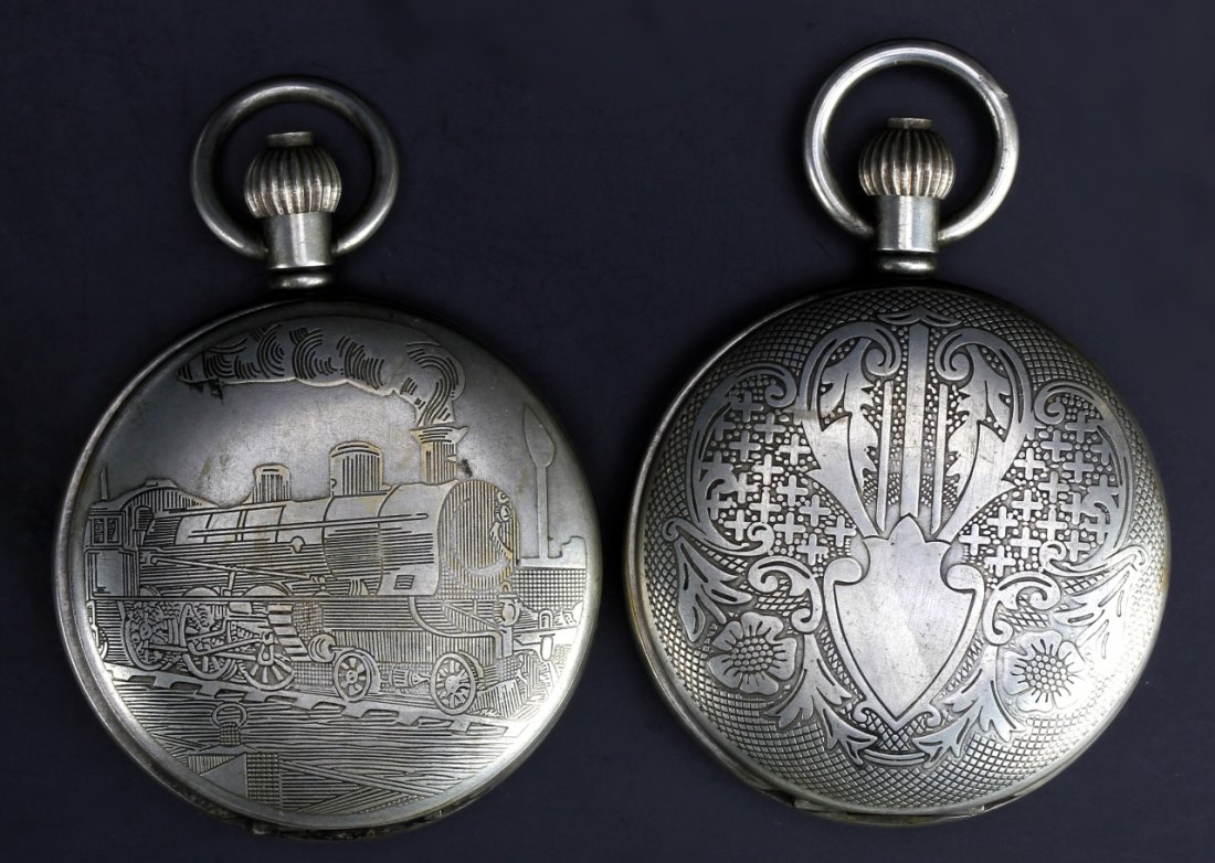 Two Chinese Market Western Pocket Watches: China, 19th or 20th C., two vintage pocket watches manufactured for the Chinese market, with silver casing, one with a shield motif and another with a train image, in working condition. Watch body dia