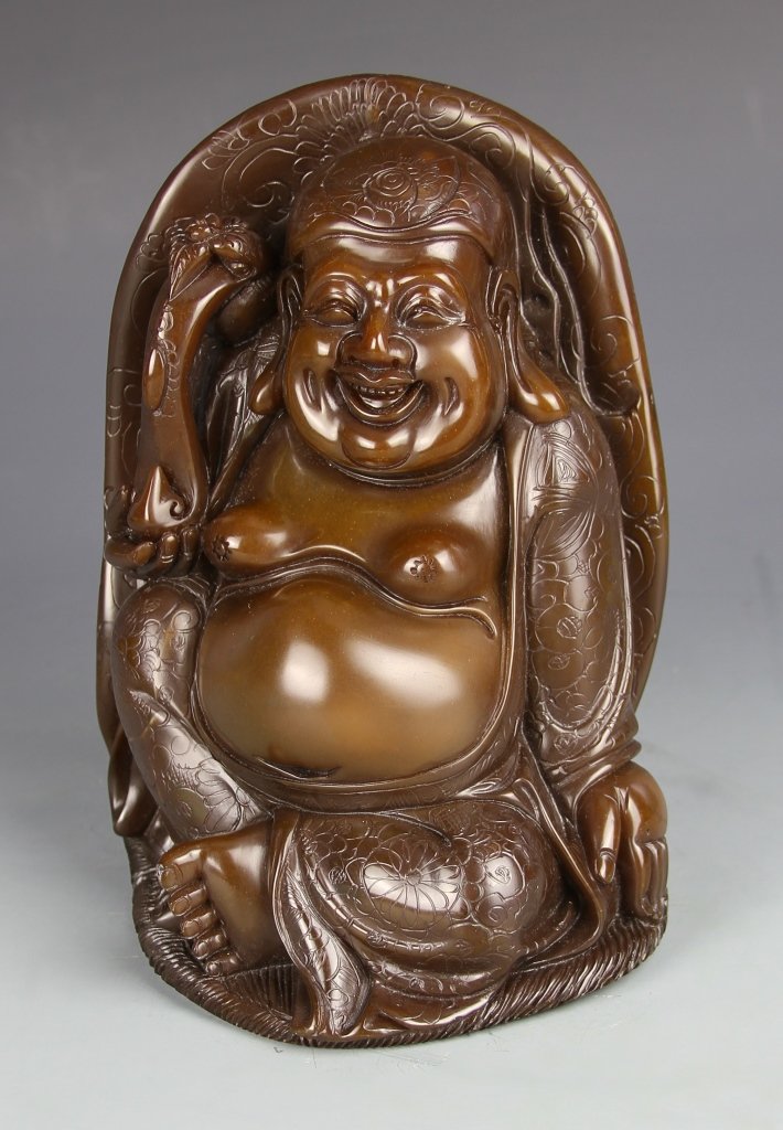 Chinese Soapstone Buddhist Figure: China, Antique soapstone Buddhist figure, smiling and in a seated position, surrounded by patterned robes. Height 8 1/2 in.