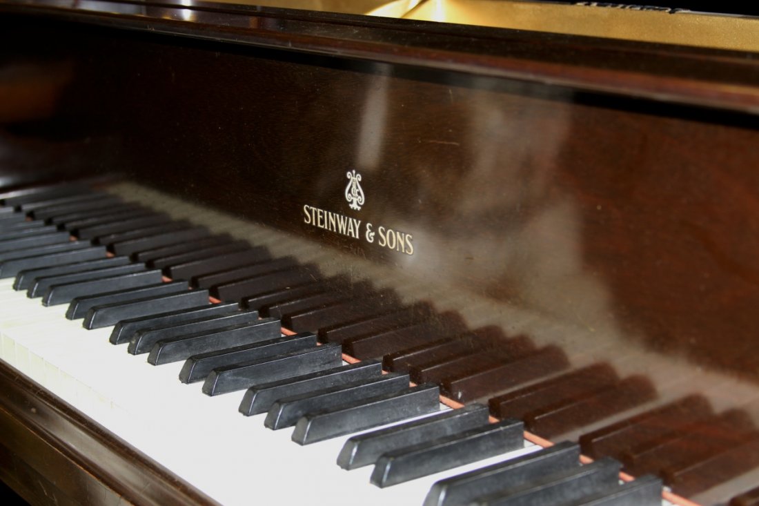 Steinway Baby Grand Piano: Antique, Steinway baby grand piano. Serial # 295776. Provenance: From the estate of Nick Sampson, Uxbridge, MA. Height: 37.3/4 in., Length: 60.5 in., Width: 55.5 in.