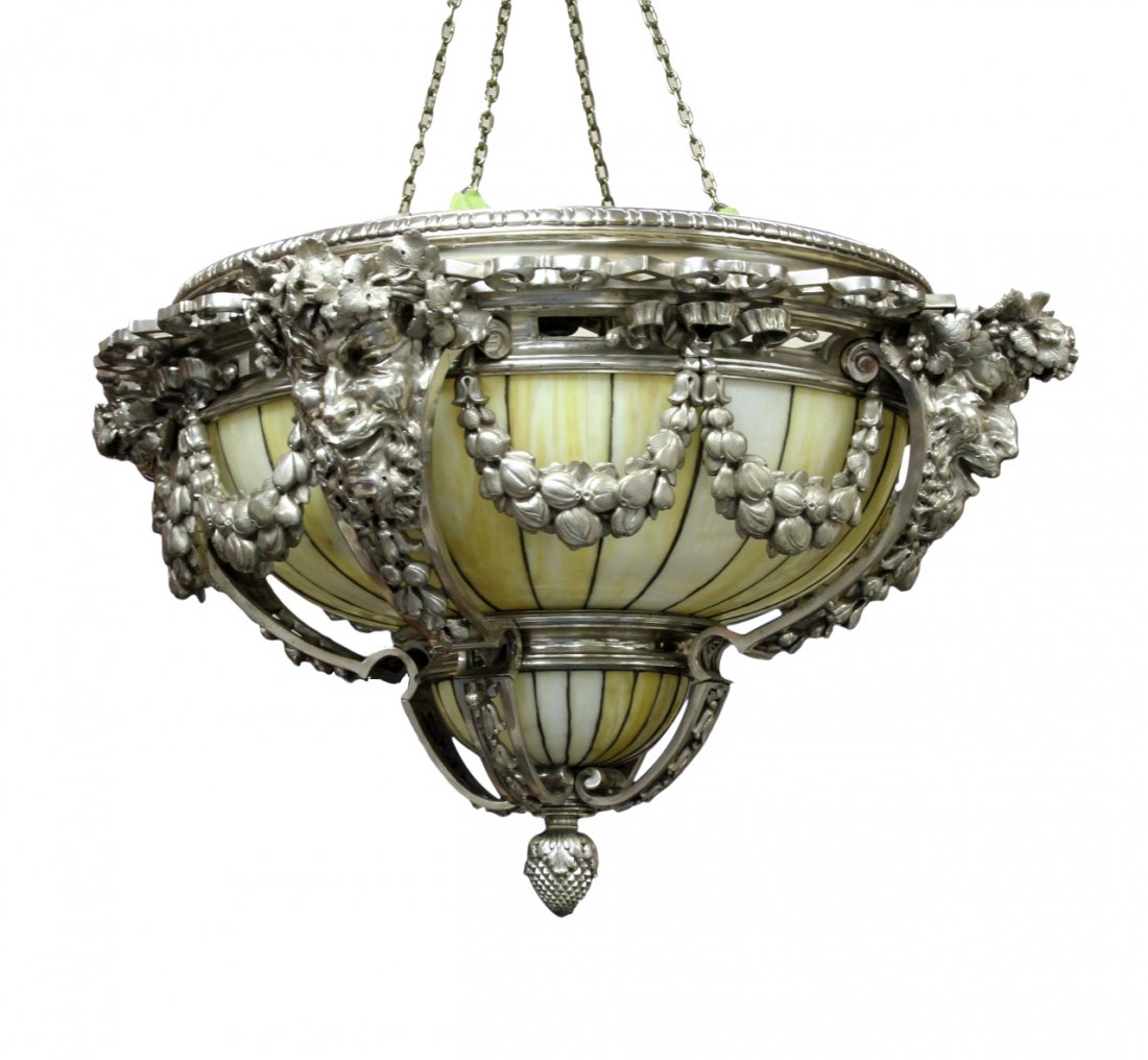 Louis C. Tiffany Silver Plated Dome Chandelier: America, silver plated heavy ornamental bronze Tiffany chandelier, double leaded glass domes of Tiffany glass. Designed by William Winter for Stanford White, intended for a foreign American embassy, b