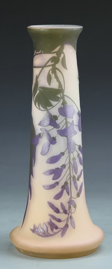 French Cameo Glass Vase, Signed Galle: France, long-necked cameo glass vase with graceful green leaves and purple floral elements, signed Galle. Provenance: From the estate of Nick Sampson, Uxbridge, MA. Height 14 in.