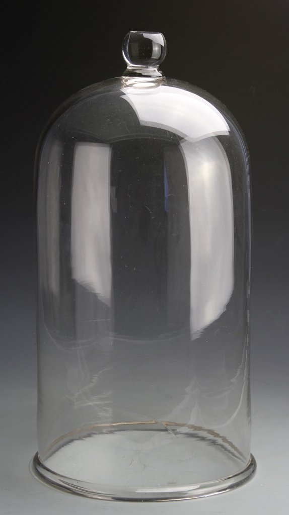 Antique Glass Dome: Antique, large glass display dome with a rounded handle. Provenance: From the estate of Nick Sampson, Uxbridge, MA. Height: 20 in., Width at Base: 9.5 in.