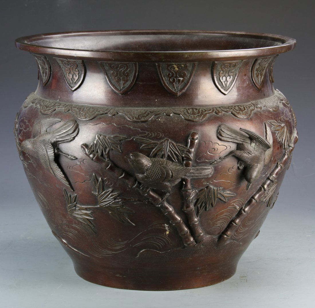 Japanese Bronze Urn: Japan, antique bronze urn with decorative bird elements and symbols, mark on base. Provenance: From the estate of Nick Sampson, Uxbridge, MA. Height 13 in., Diameter 15 in.