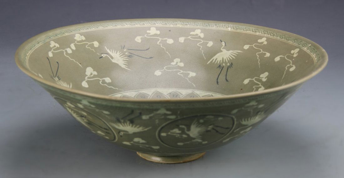 Korean Antique Celadon Bowl: Korea, Antique, celadon bowl decorated with cranes and floral motifs. Height 4 in., Diameter 12 3/4 in.
