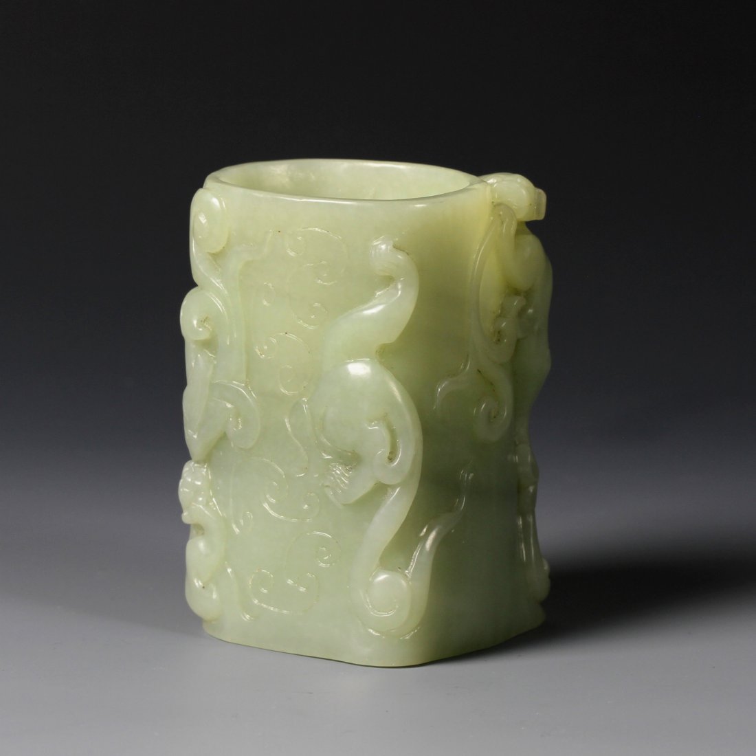 Chinese Jade Brush Pot: China, Early 20th C., jade brush pot in a cylinder shape carved with chi dragon. Height 3 1/8 in.