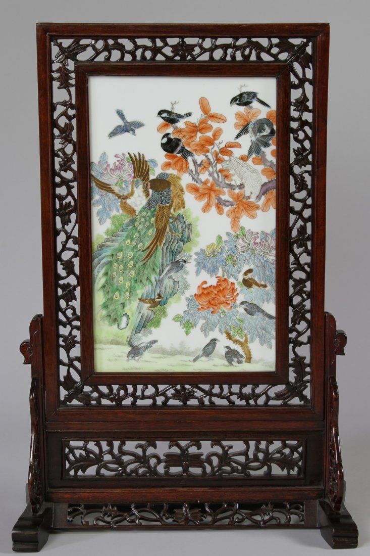 Chinese Famille Rose Table Screen: China, Late 19th or Early 20th C., porcelain table screen, decorated with birds and flowers, rosewood frame and stand. Height 16 1/4 in., Width 10 in.