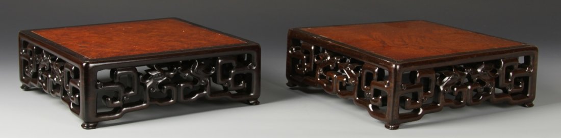 Chinese Carved Burlwood Stands: China, 20th C., set of two burlwood stands, beautifully carved pattern extending around the base. Width 8 3/4 in. Length 8 3/4 in., Height 3 in.