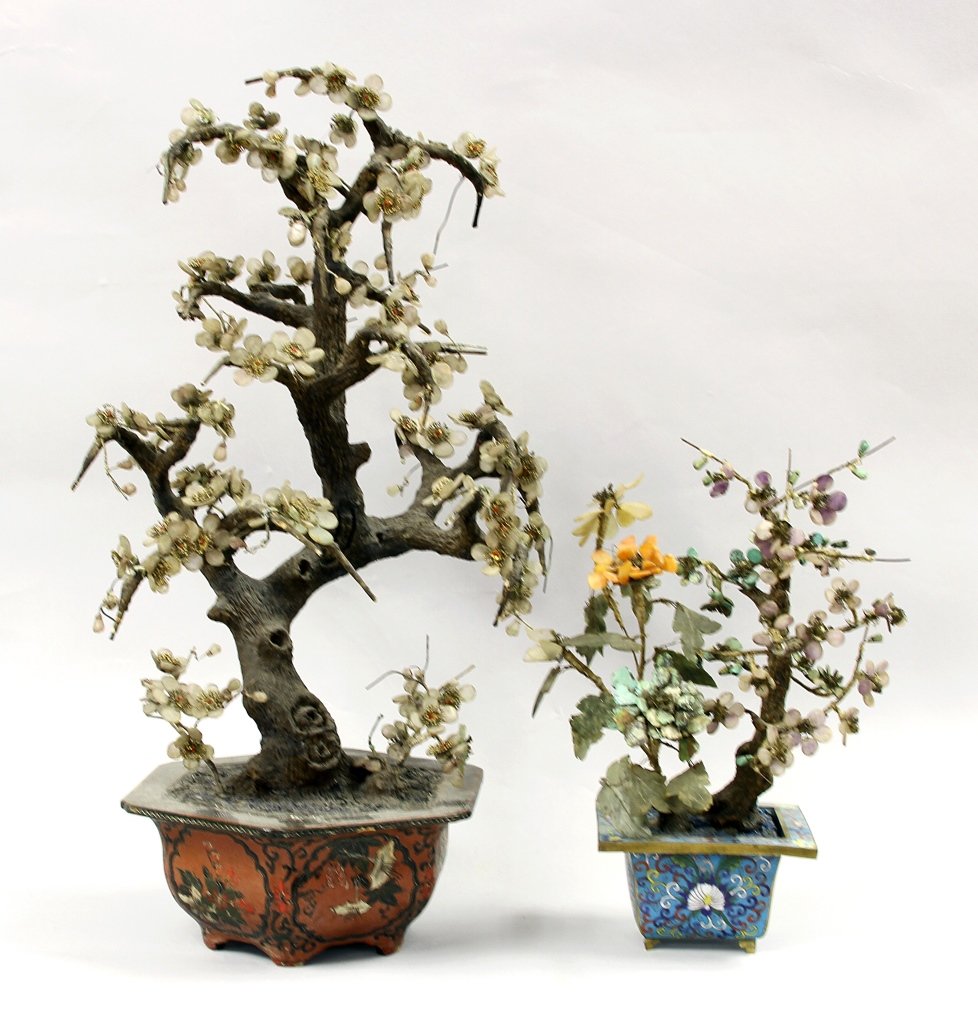 Chinese Lacquer and Stone Flowering Tree: China, one flowering plum tree in a lacquer pot, flowers composed of quartz and wires with coral beads; one tree with turquoise, jade, carnelian flowers in Cloisonne pot. Height of largest 21 in.