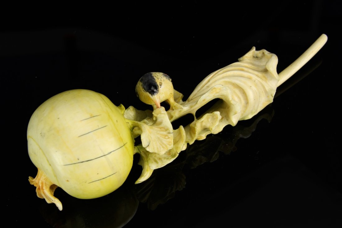 Chinese Carved Ivory Radish: China, 19th C., expertly carved ivory figure of a radish, accented in green, with intricately detailed elements. Length 7 in. Provenance: From the private collection of Mrs. Pearl K. Jennison, of New 