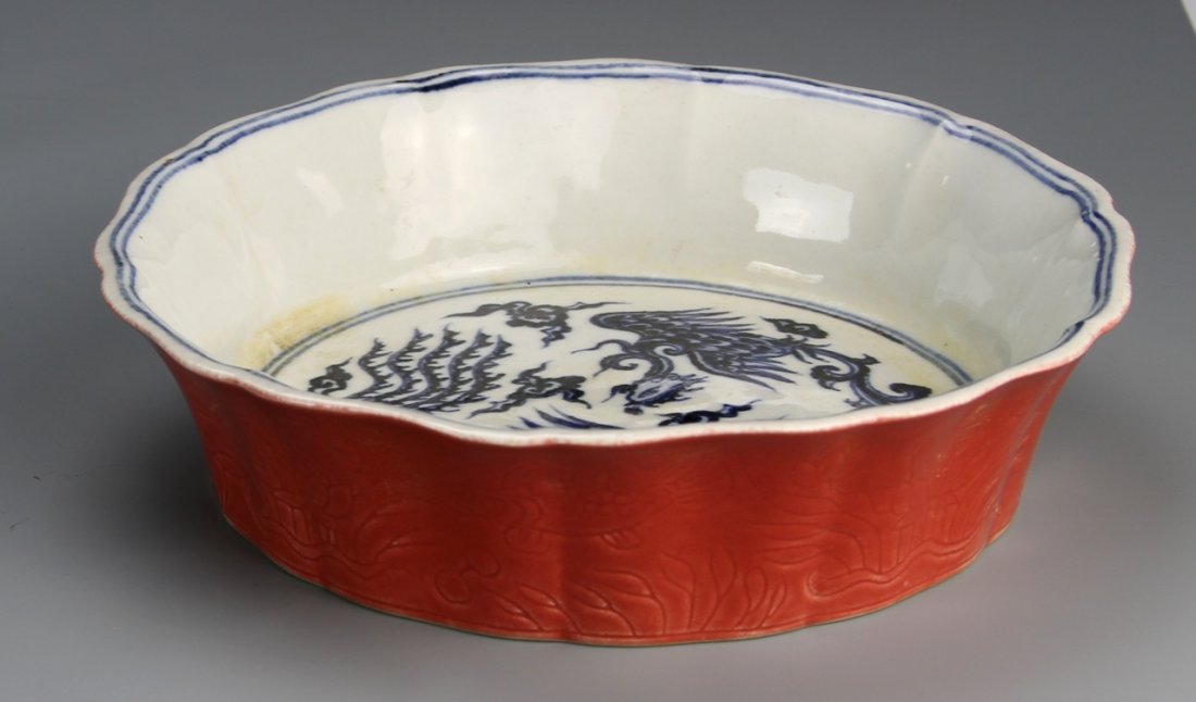 Chinese Foliated Blue and White Brush Washer: China, blue and white brush washer, painted in the center in rich cobalt blue of a pair phoenix amid ruyi clouds, the exterior coral enameled lobed body incised with fishes amid aquatic plants, base w