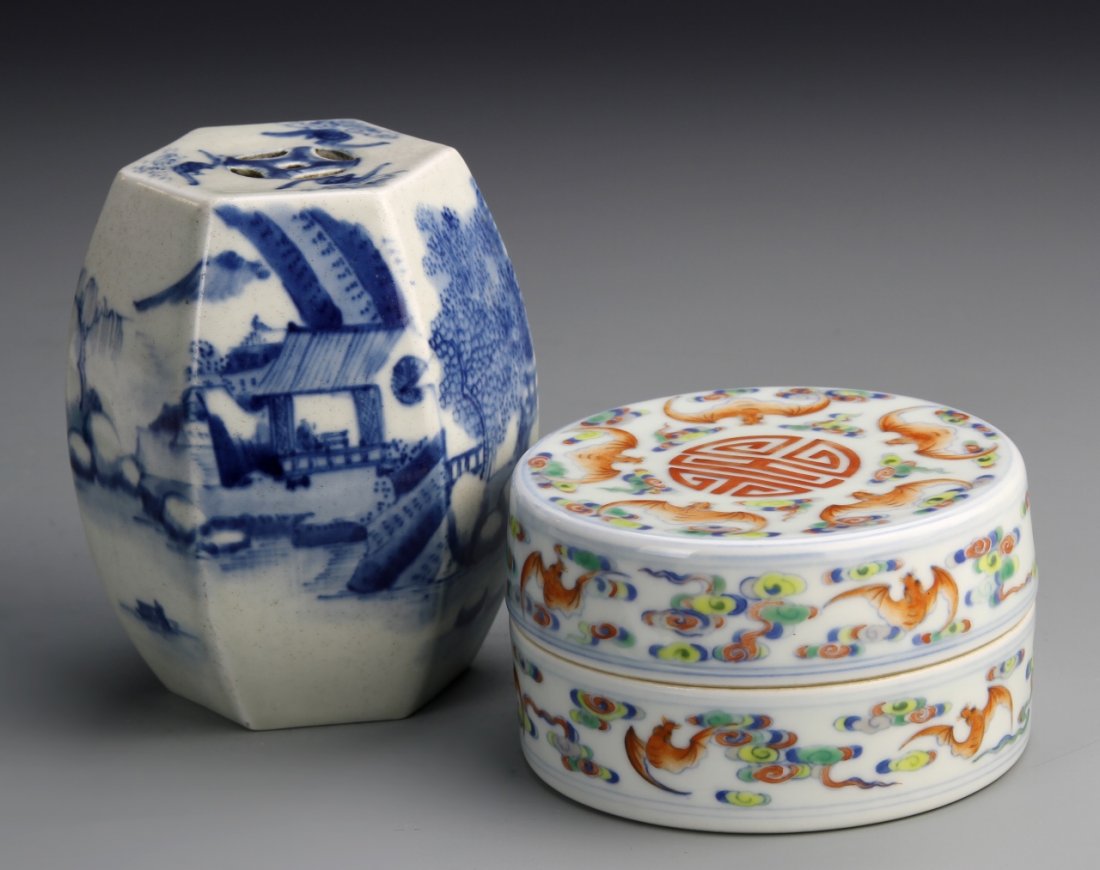 Two Chinese Porcelain Pieces: China, 19th C., two porcelain pieces; one brightly painted ink box with auspicious symbols of longevity and bats; and one drum-shaped vase painted in blue with a landscape scene with buildings. Height