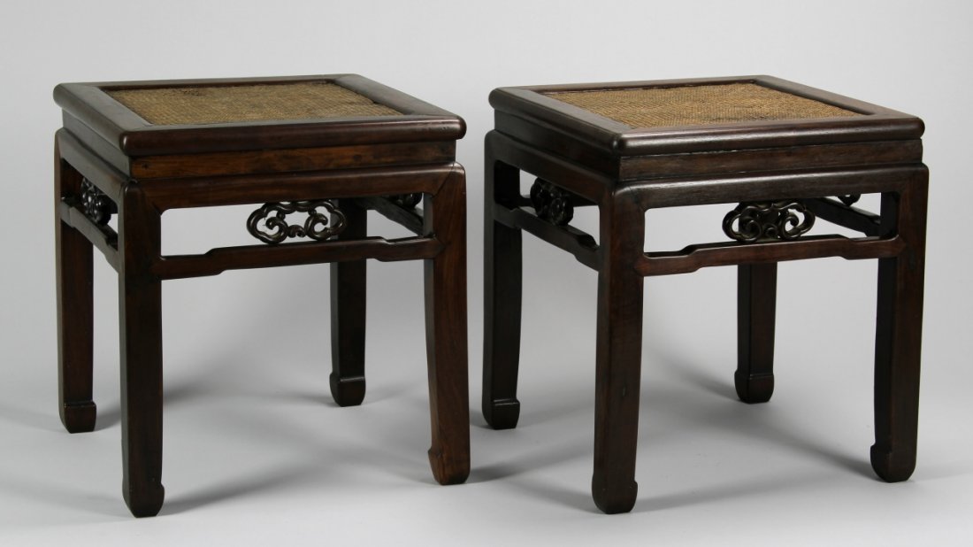 Pair of Chinese Zitan Wood Stools: China,18-19th C., pair of rectangular Zitan wood stools, with woven seats, and traditional Chinese carving on the sides. Height 17 1/2 in., Width 15 1/2 in., Depth 15 1/2 in. Provenance: From the coll