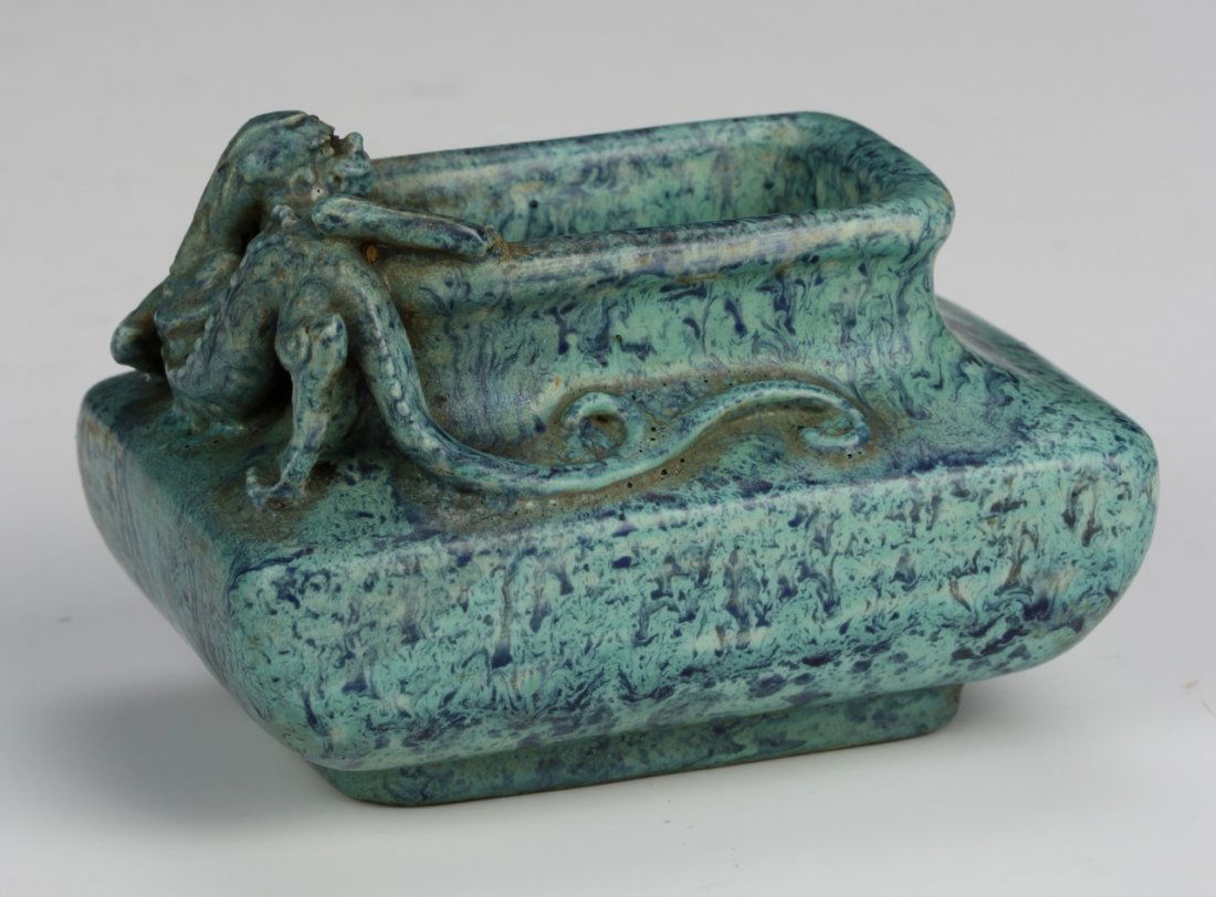 Chinese Jun Ware Water Coup: China, 19th C., Jun ware water coup in rectangular form with a Chi dragon at its mouth, with mottled blue and green coloring. Width 3 in. Length 2 in. Height 1 3/4 in.