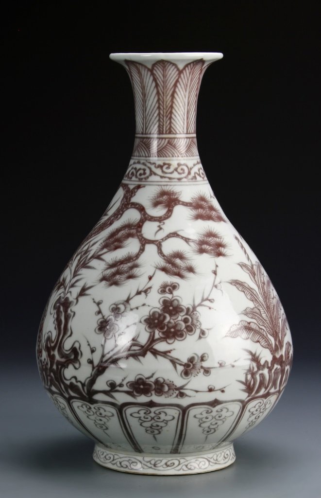 Chinese Copper Red Yuhuchunping: China, antique, copper red Yuhuchunping, flared rim on pear shaped body with a footed base, natural motif and auspicious symbols in copper red against a white background. Height 12 in.
