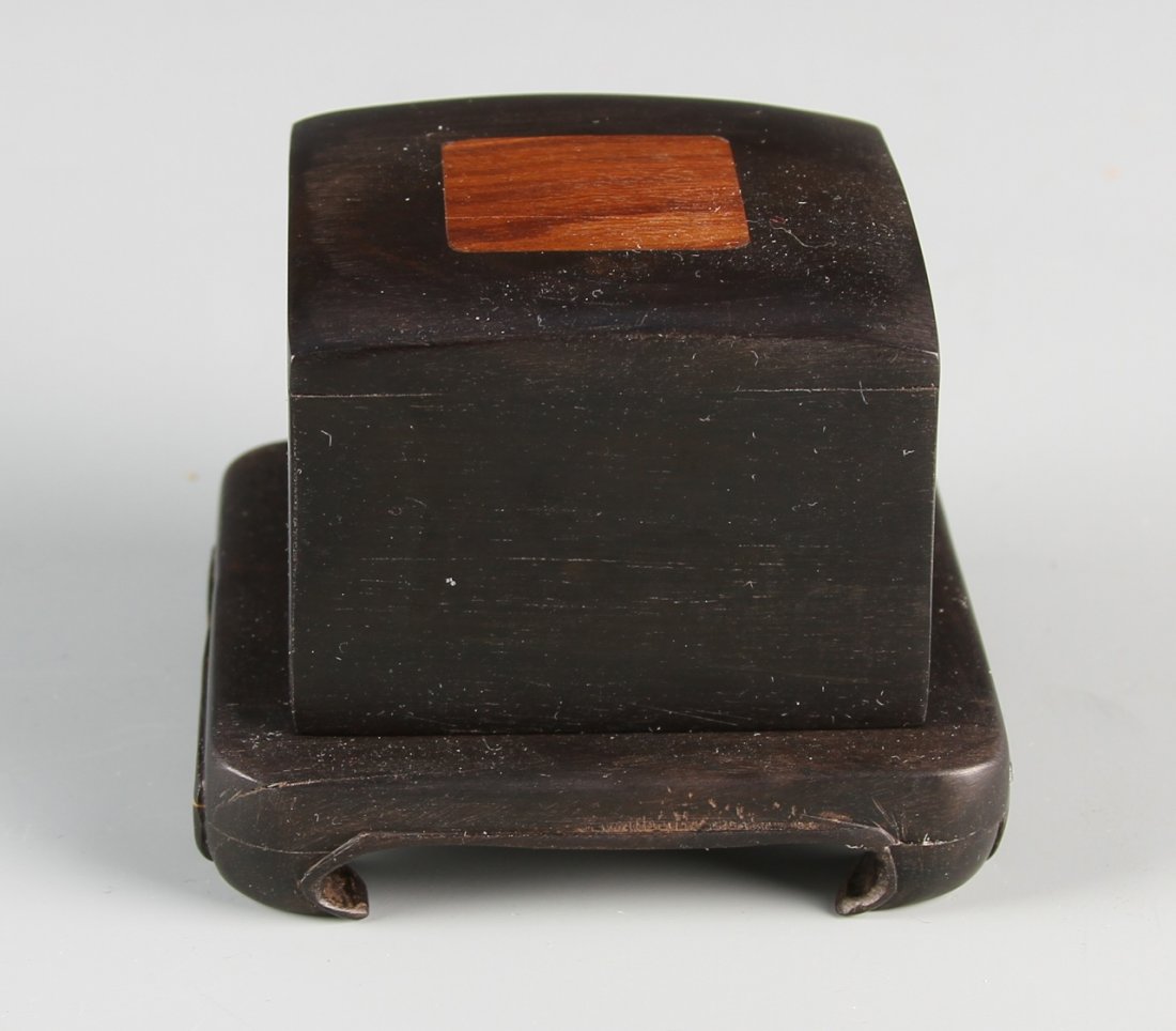Chinese Tianhuang Stone Seal Chop: China, Tianhuang seal chop, in square form, with rounded corners, and black Chinese characters, with wood box and base, with inlay on top. Height 1 in., Width 1 3/4 in.