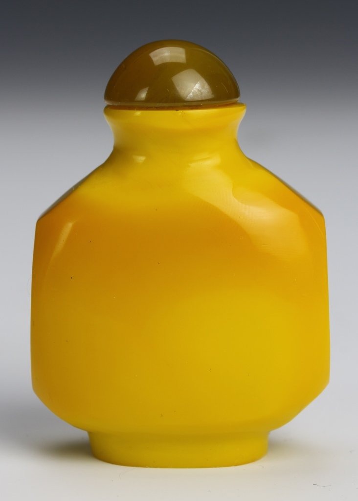 Chinese Peking Glass Snuff Bottle: China, 19th C., Peking glass snuff bottle, flattened, square form, flared, rounded rim, flat base, with rounded brown stopper. Height 2 1/4 in.