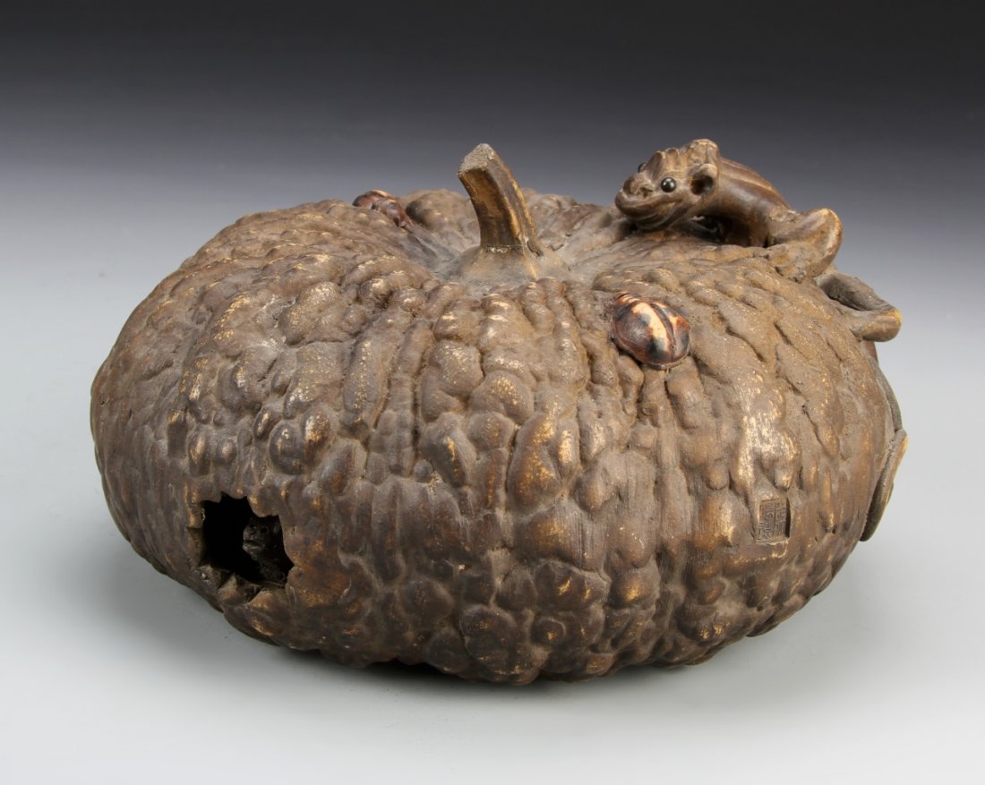 Chinese Very Rare Yixing Pumpkin: China, very rare Yixing pumpkin with chi dragon, turtle, and bugs, with very textures surface, and in brown hues, Chen Ming Yuan mark. Height 5 3/4 in., Length 7 in.