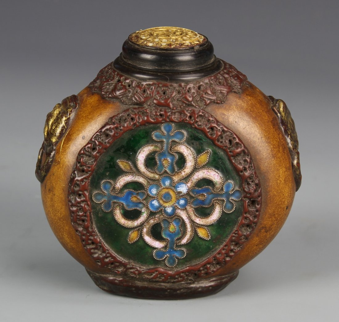 Very Rare Chinese Snuff Bottle: China, 19th C., very rare and large snuff bottle, made of cloisonne, molded gourd and ivory, the face with an overlapping floral design, bordered with organic pattern carved in relief, with two mythic