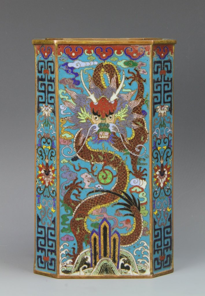 Chinese Cloisonne Dragon Vase: China, 19th C., cloisonne dragon vase, octagonal cylindrical form, gilded edge on rim and base, brightly painted design, Qianlong mark. Height 6 7/8 in.