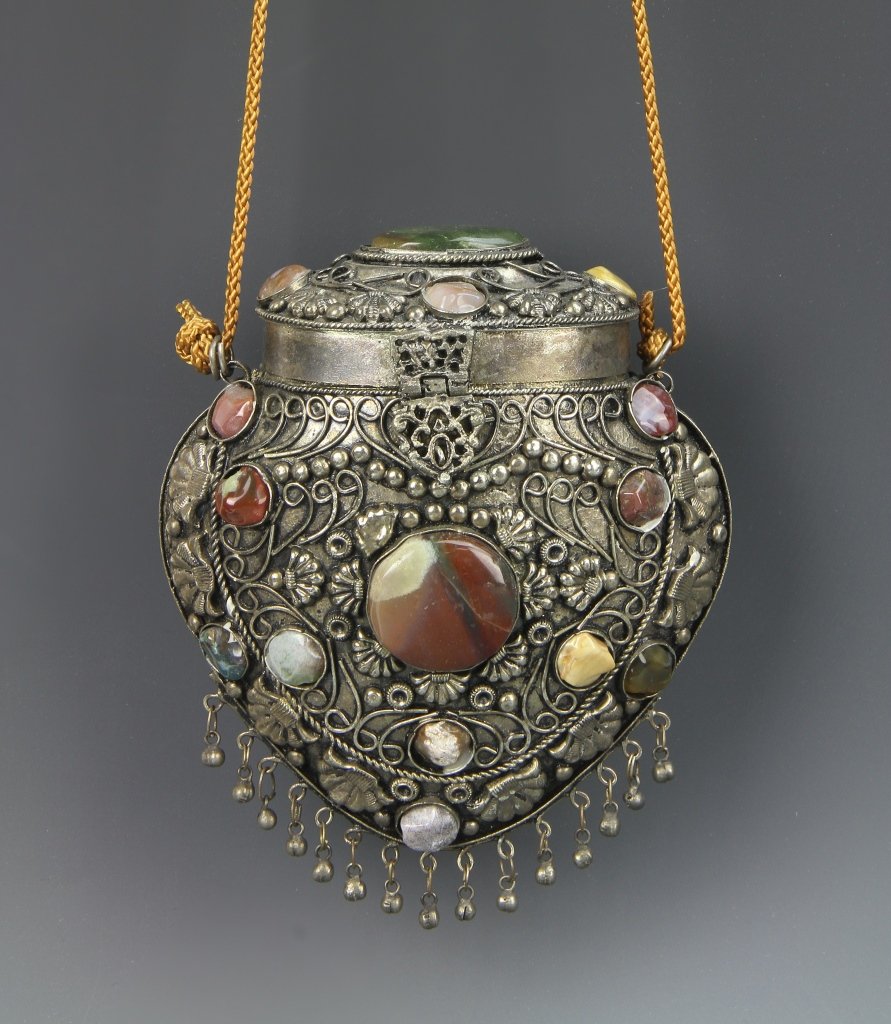 Chinese Metal Handbag with Jade and Agate Inlays: China, metal handbag with jade and agate inlays, in the form of a teardrop, the body with added floral patterns, the stones inlaid in various forms and sizes, with small hanging balls along the base. 