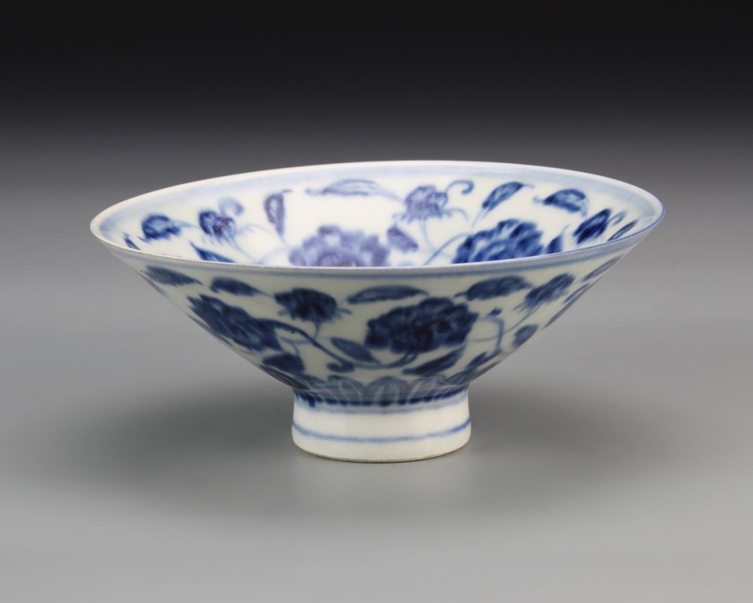 Chinese Blue and White Bowl: China, blue and white bowl, raised base, with wide flared rim, white ground with blue floral designs on interior and exterior, mark. Height 2 1/4 in., Width 5 7/8 in.