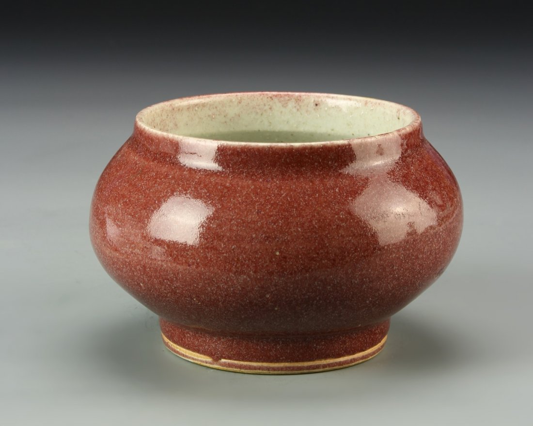 Chinese Brush Washer: China, brush washer, bulbous in form, with a slightly raised base, red speckled glazed, with a high shine surface. Height 3 1/2 in.