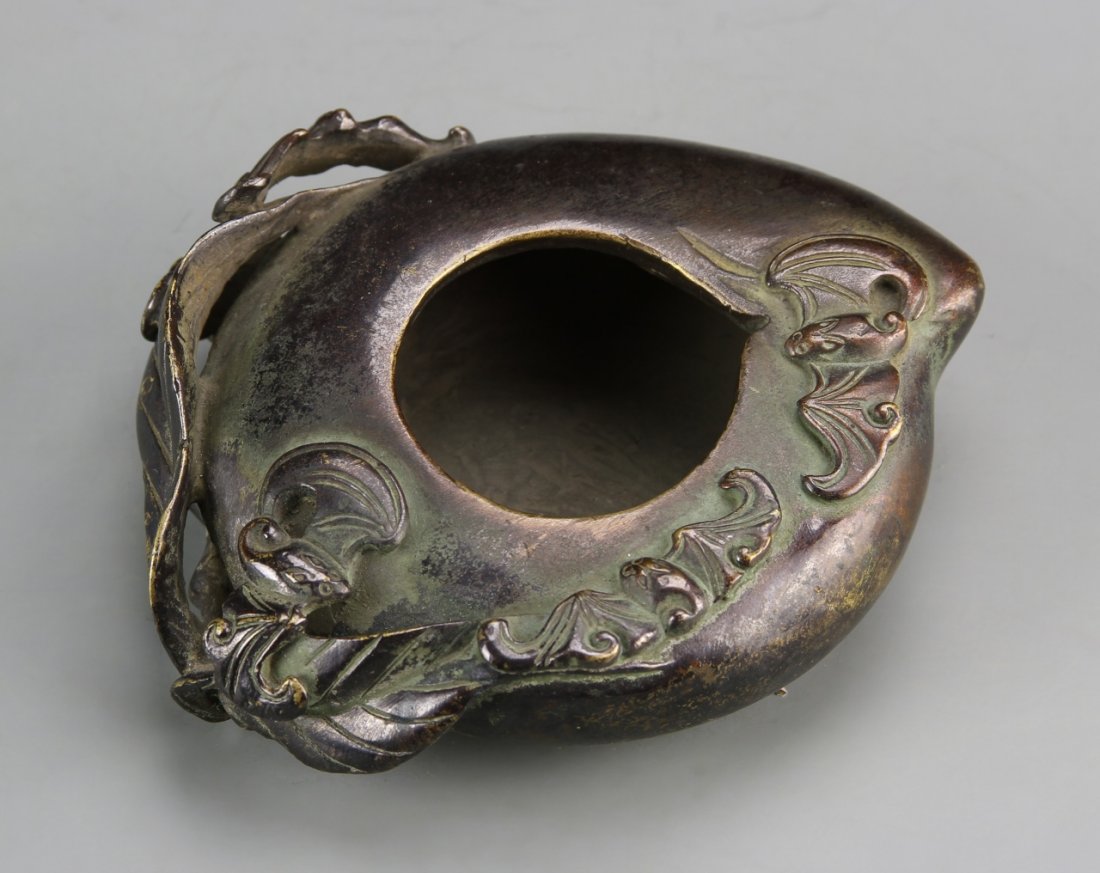 Chinese Bronze Brush Washer: China, ROC Period, bronze brush washer, in the form of a peach, with detailed leaves, openwork detail, and patina. Width 4 3/4 in., Length 3 3/4 in., Height 1 1/2 in.