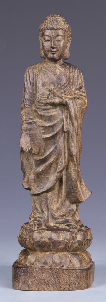 Chinese Chen Xiang Wood Buddha: China, Cheng Xiang wood Buddha, in standing position, with flowing robes and detailed face, and natural wood grain. Height 8 3/4 in.