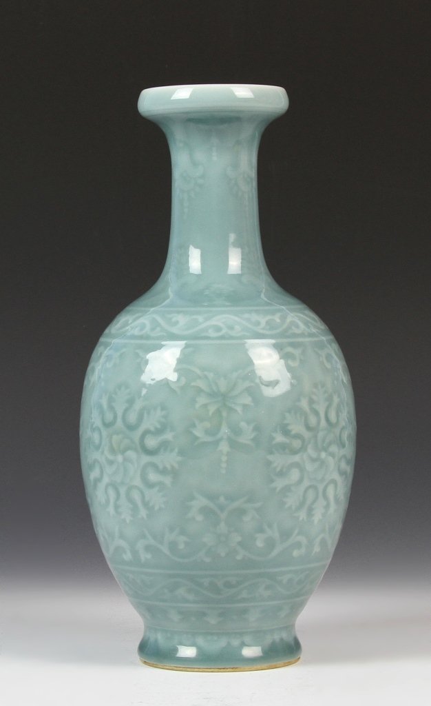 Chinese Light Blue Glazed Vase: China, 18-19th C., light blue glazed vase, everted rim on bottle shaped body with slightly flared foot, Yongzheng mark on base. Height 10 in.