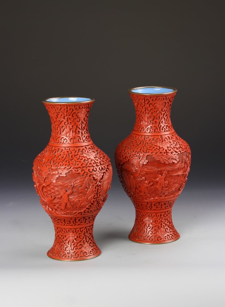 Pair of Chinese Cinnabar Vases: China, ROC Period, pair of cinnabar vases, bulbous body, with flared rim and base, in deep red hue, with intricately carved surface, drilled. Height 10 in.