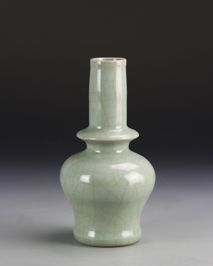 Chinese Song Longquan Celadon Vase: China, Song Longquan celadon vase, the curved body with broad shoulder, and splayed foot at the base, covered overall with silky smooth sea-green glaze suffused with icy crackles. Height 7 1/4 in. Pro