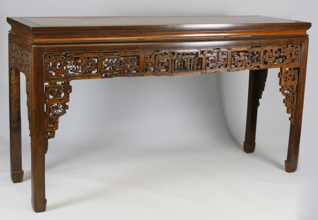Chinese Huanghuali and Mix Wood Altar Table: China, 19th C., magnificent and rare large Huanghuali and mixed wood altar table with elaborately carved apron, elements of Satinwood on the top, and gleaming finish. Height 47 in., Width 84 in., Dept
