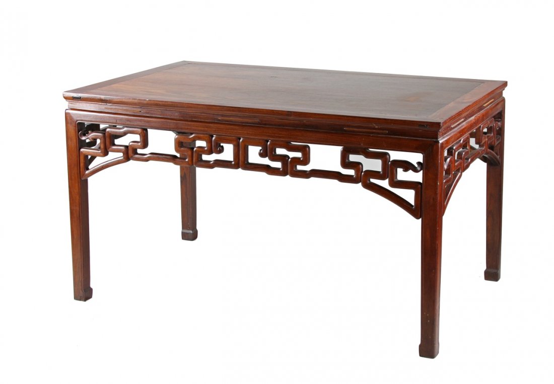Chinese Huanghuali Table: China, ROC Period, Huanghuali table, apron with openwork scroll, beaded squared legs ending in incurve hoofed feet. Length 56 3/4 in., Width 35 1/2 in., Height 37 5/8 in. Provenance: Skinner Auctionee