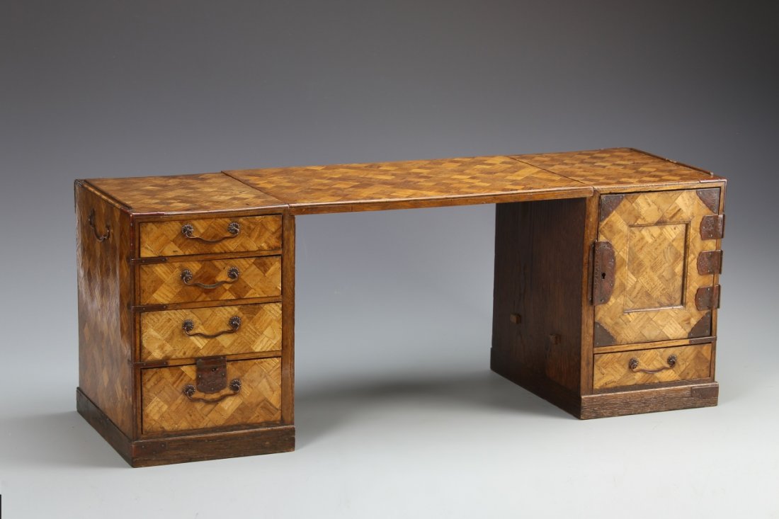 Japanese Wood Tansu Box: Japan, Meiji Period, wood Tansu box, with parquet surface, natural wood grain showing, multiple draws, and metal details and flat oblong top. Height 13 in., Width 10 7/8 in., Depth 8 in.