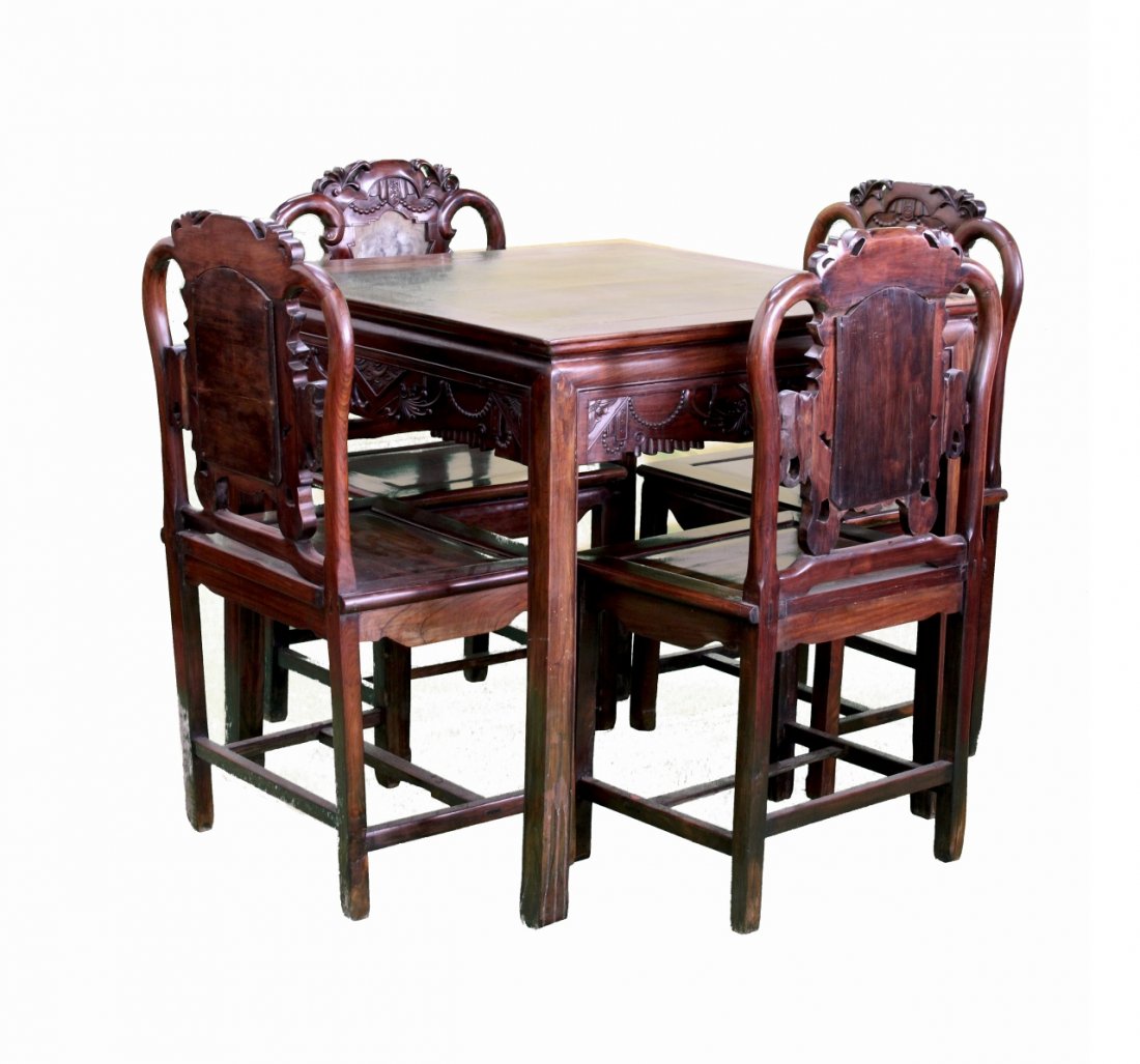 Chinese Hongmu Chairs and Table: China, Hongmu chairs and table, intricately carved open work design on back of chairs, elaborately decorated apron on the table. Chair: Height 39 1/2 in., Width 20 1/2 in., Table: Height 24 in., Width