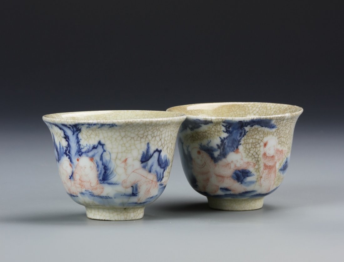 Pair of Chinese Famille Rose Tea Bowls: China, 19th C., a pair of Famille Rose tea bowls, flared rims with tapering sides to footed base, delicate floral design against a crackle ground, mark on base. Height 2 1/2 in.