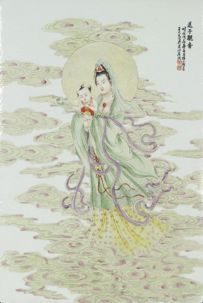Chinese Famille Rose Plaque: China, ROC Famille Rose plaque of Guanyin, standing among swirling clouds, wearing green and yellow robes with purple ribbons and holding a baby with calligraphy signature. Length 21 3/4 in., Width14