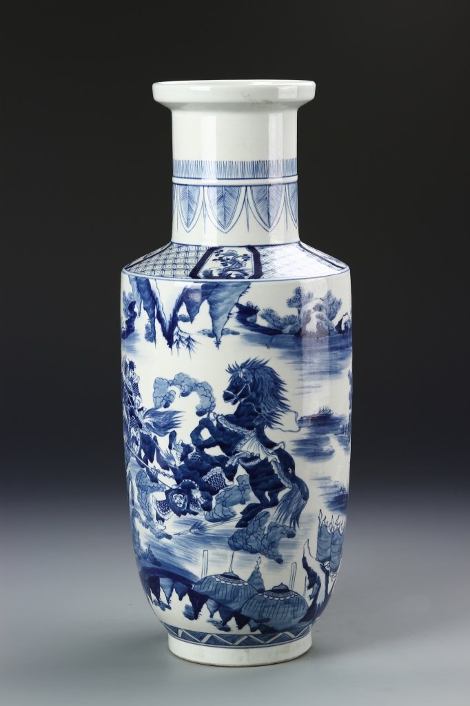 Chinese Blue and White Vase: China, ROC Period, blue and white vase, on a raised base, with rectangular shoulders and flared rim, decorated with an illustration of a battle scenery, Kangxi mark. Height 16 in.